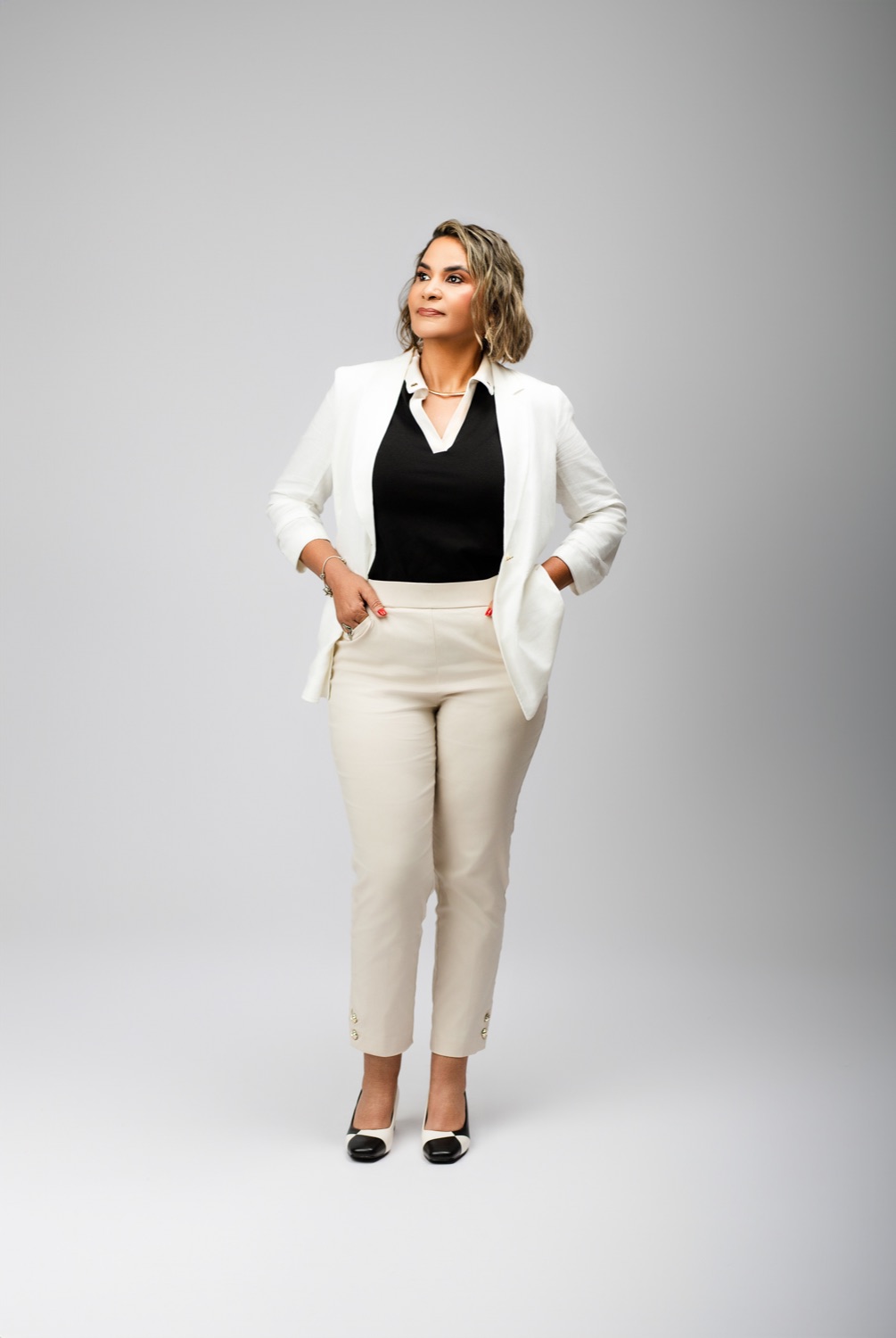 Marlene Eggea, style consultant, in a light blazer with a serene presence.